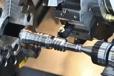 CNC lathe precision turning of metal shaft — Baked Industries